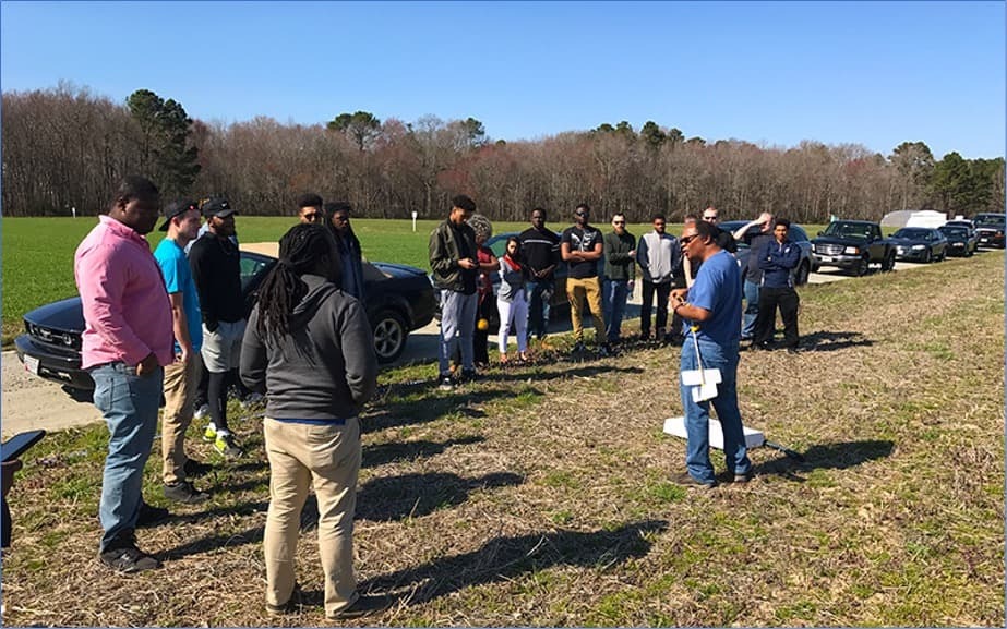 Group of students and instructors post launch